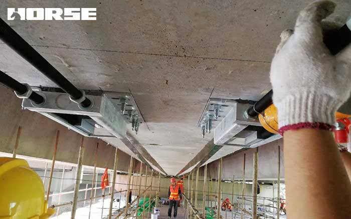 prestressed carbon fiber plate to strengthen bridge beam 