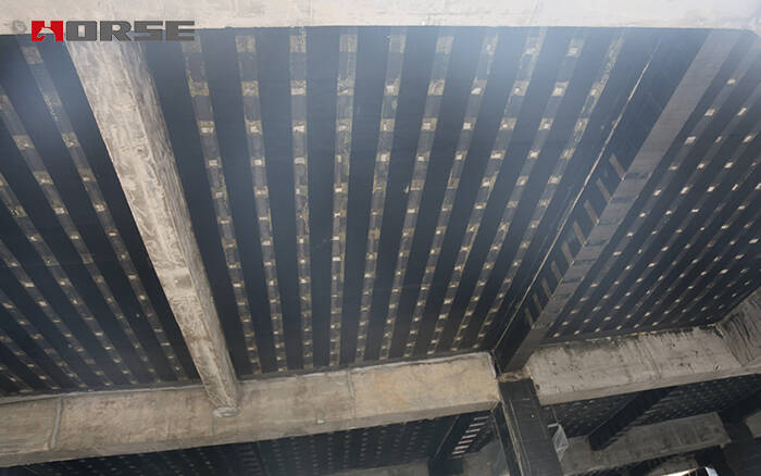 Beam and slab strengthening by CFRP WRAP
