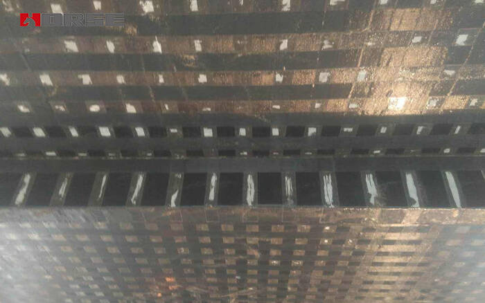 Carbon fiber fabric reinforcement for concrete slab