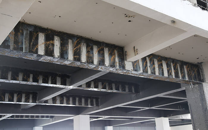 Carbon fiber fabric reinforced concrete beam
