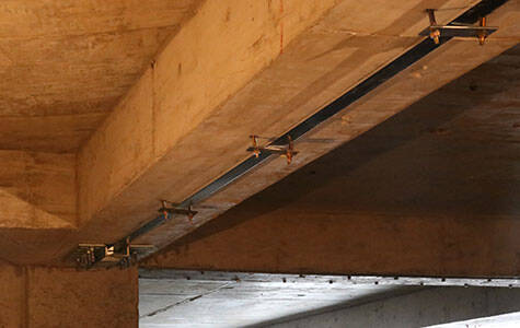 Reinforced concrete beams strengthened with CFRP laminate