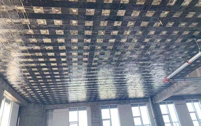 carbon fabric is applied to the ceiling slabs.