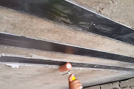 bonding carbon fiber laminate on concrete