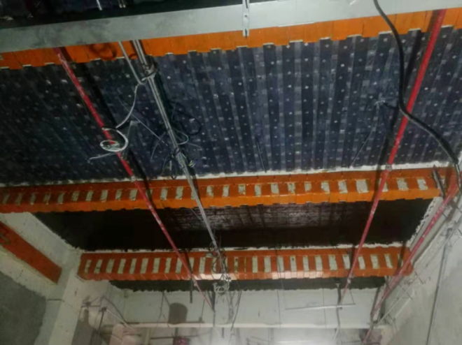 Carbon Fiber Reinforcement and Repair of Green Tile Building