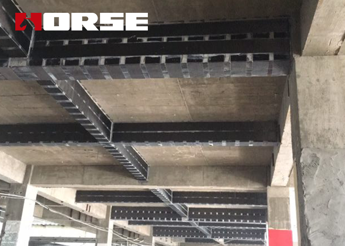 R.C. Beams Strengthening by Carbon Fiber Reinforced Wrap