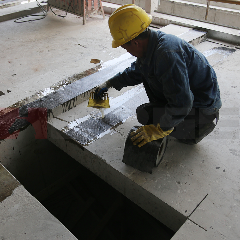 Reinforcement Of Existing Slabs With UD Carbon Fiber Cloth