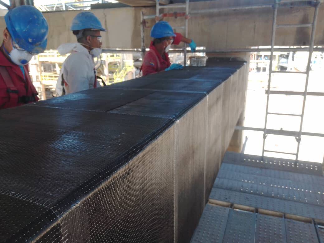 Rehabilitation of Damaged Reinforced Concrete Beams With HM-30 Unidirectional Carbon Fiber Fabric