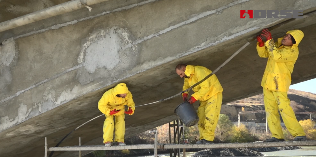 Reinforced Exposed Concrete Bridge With Carbon Fiber Strip