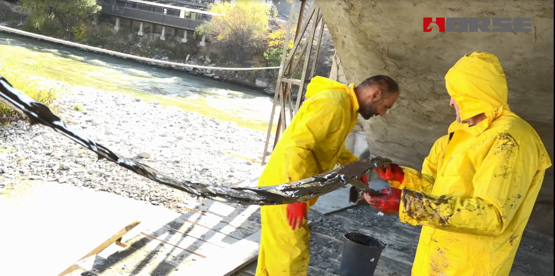 Reinforced Exposed Concrete Bridge With Carbon Fiber Strip