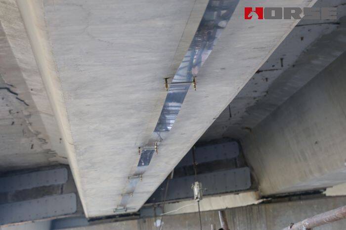 Reinforcement of High-Speed Railway Bridge By Prestressed FRP Plate