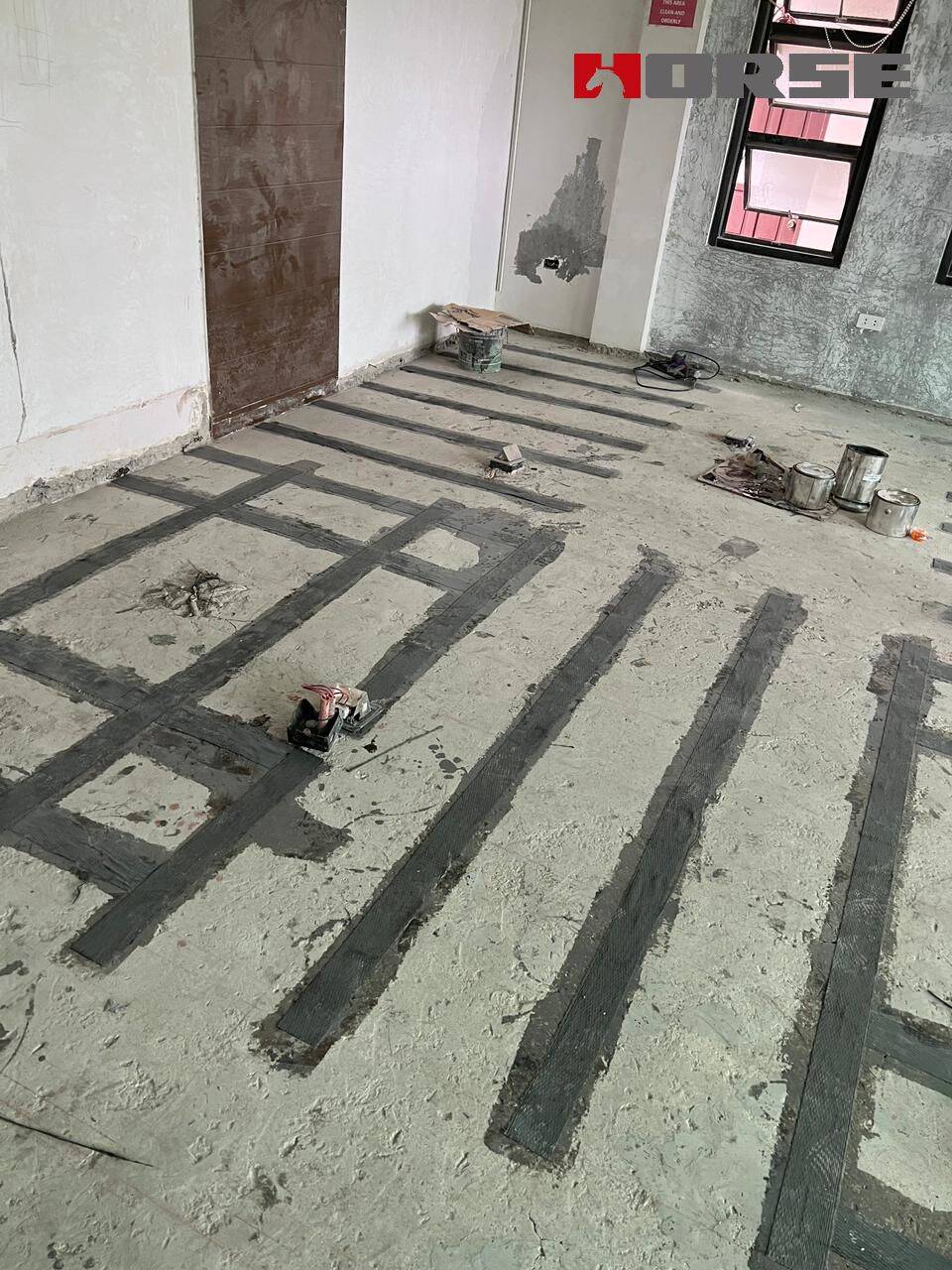 Repair Cracks on Concrete Floor Slab with Crack Injection and Carbon Fiber Sheet