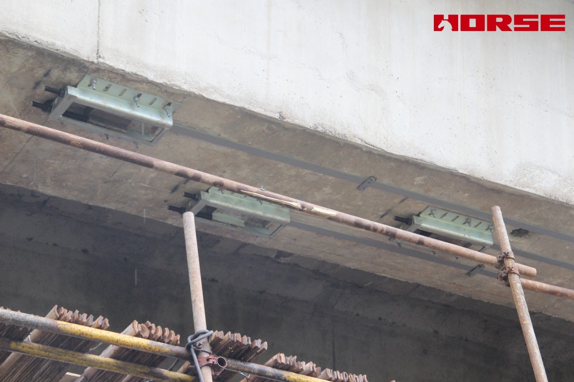 Pre-stress Carbon Fiber Laminates "Lock" Concrete Cracks