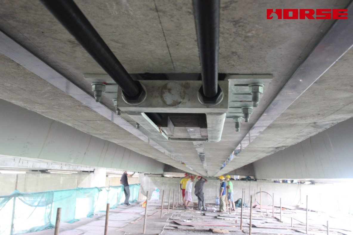 Pre-stress Carbon Fiber Laminates "Lock" Concrete Cracks