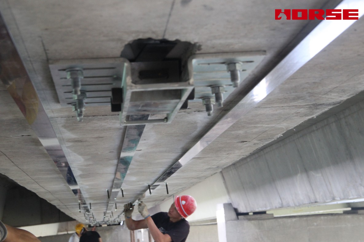 Pre-stress Carbon Fiber Laminates "Lock" Concrete Cracks