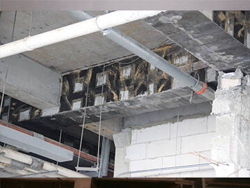 FRP Repair of Corrosion-Damaged Reinforced Concrete Beams