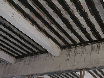 Flexural reinforcement of concrete slabs by carbon fiber fabric