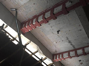 Strengthening scheme for damaged frame beam by steel strip