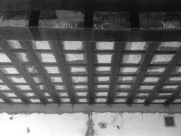 Carbon fiber fabric reinforcement for concrete slab