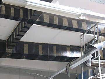 Structural seismic strengthening by carbon fiber fabric