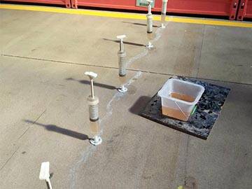 Slab crack repair by epoxy injection adhesive