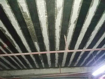 Slab strengthening by fiber reinforced polymer(FRP) fabric