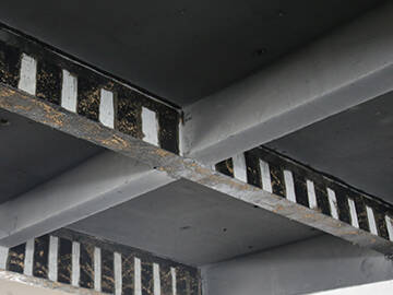 Carbon fiber fabric reinforced concrete beam