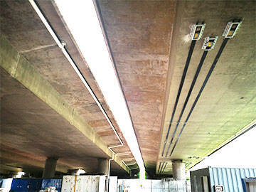 Concrete bridge strengthening by prestressing CFRP plate