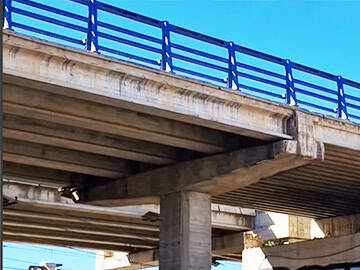 Strengthening of a Prestressed Concrete Multi-Girder Bridge with CFRP Laminate and U-wrap
